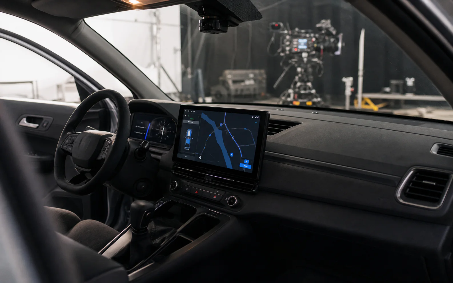 Functional vehicle dashboard interface prepared inside a picture car on a soundstage